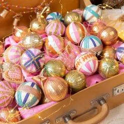 Boule de noël graphique rayée rose