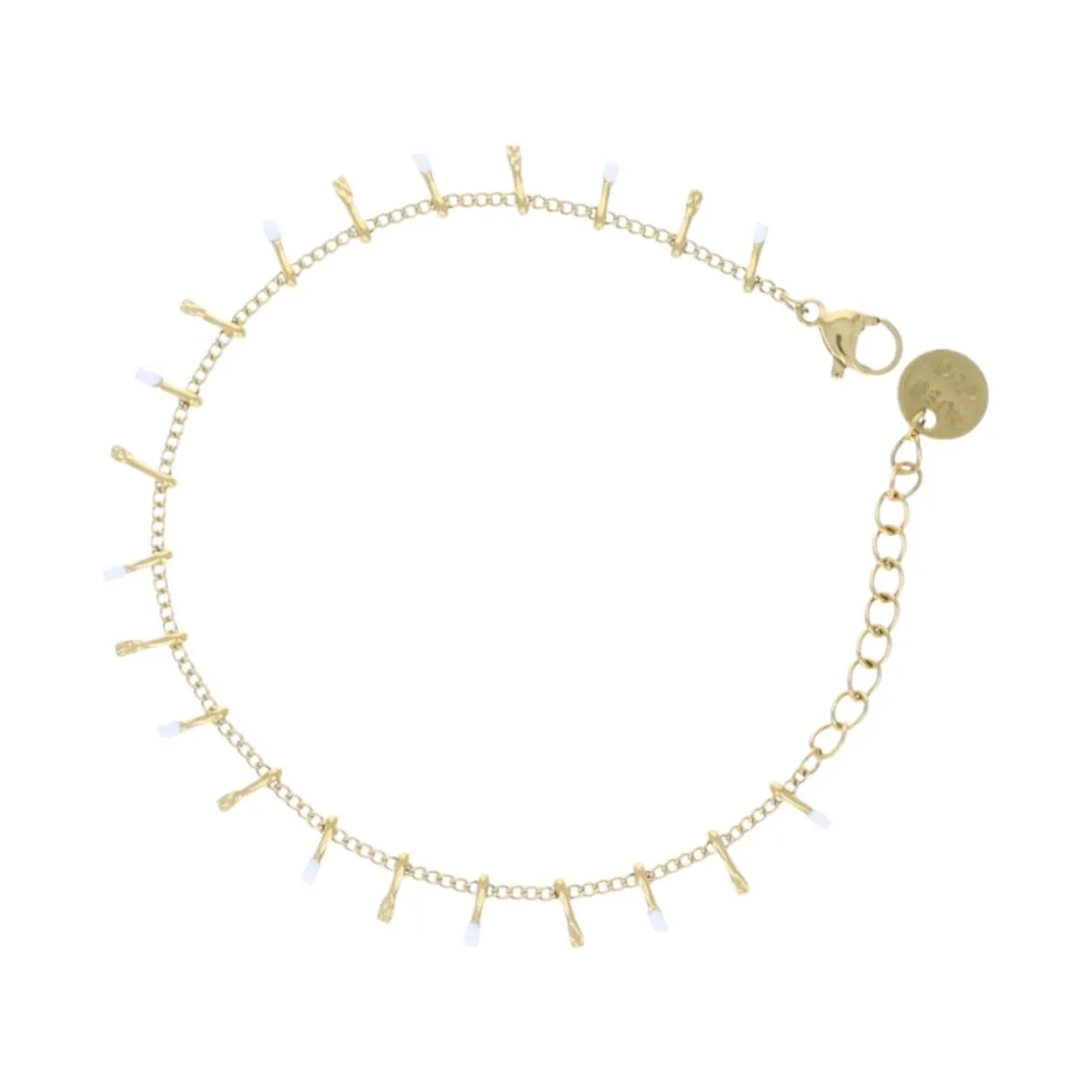Bracelet doré et gouttes blanches
