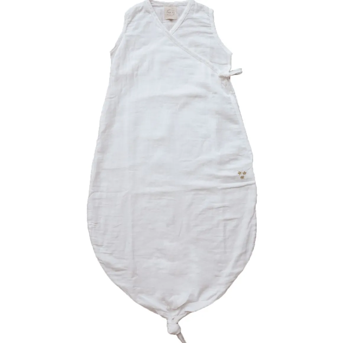 Gigoteuse d'été blanche avec nœud