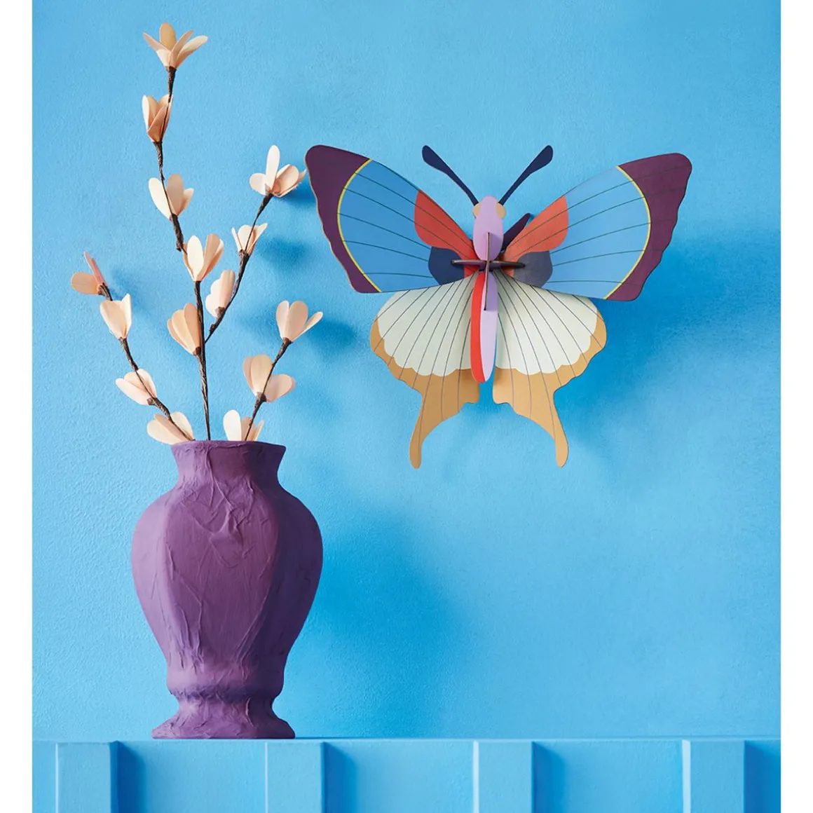 Trophée papillon à franges prune